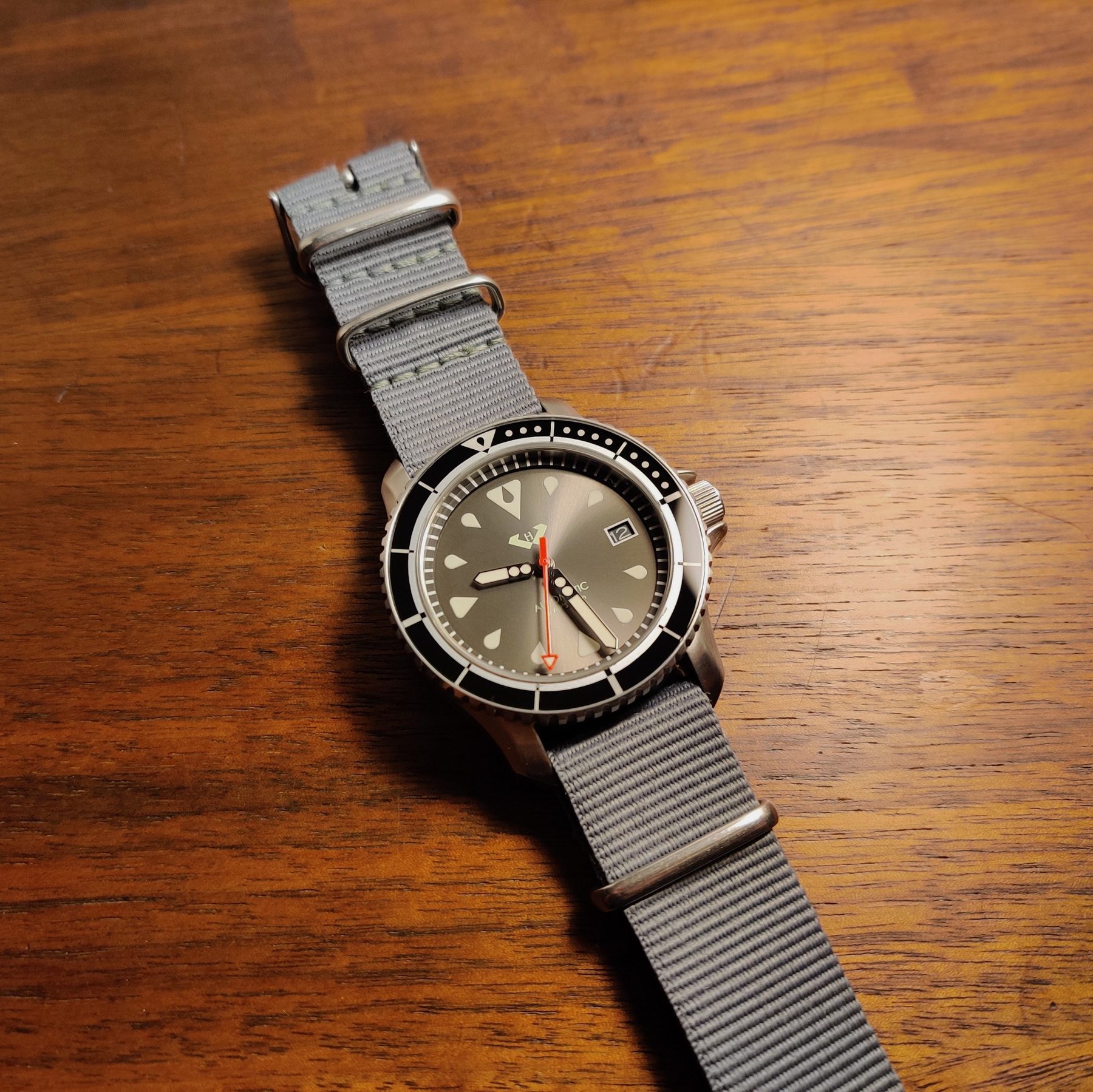 Hyalus watch on a wood surface